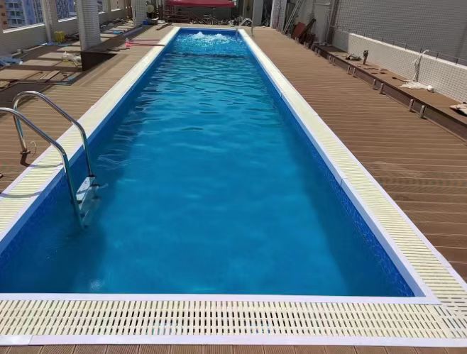 Fiberglass reinforced plastic swimming pool in the swimming